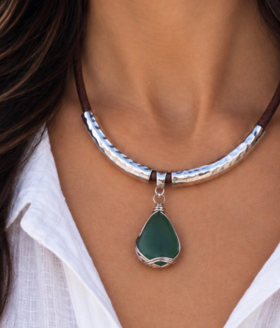 Model wearing the deep green sea glass statement necklace
