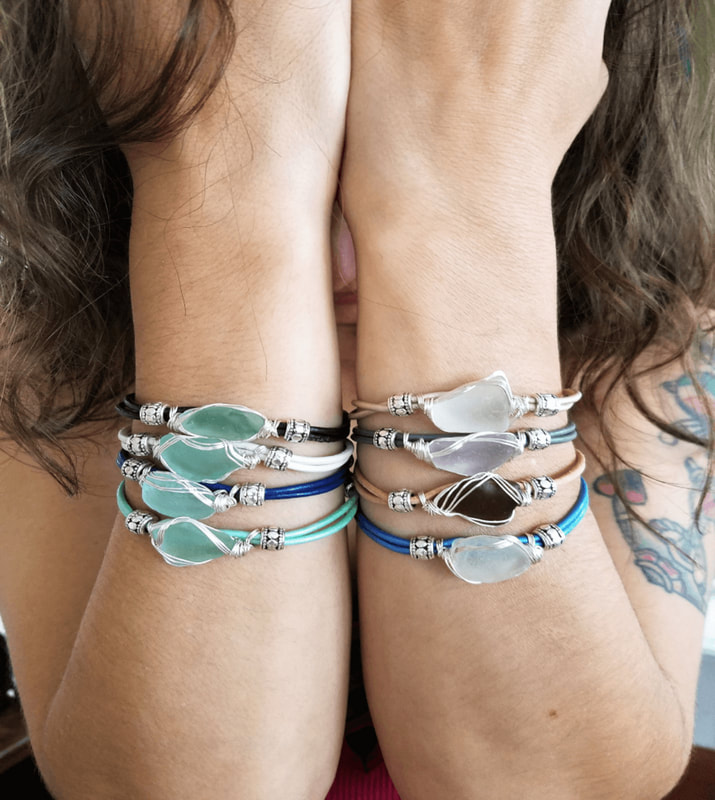 8 Sea Glass Bracelets on Wrists Forearms