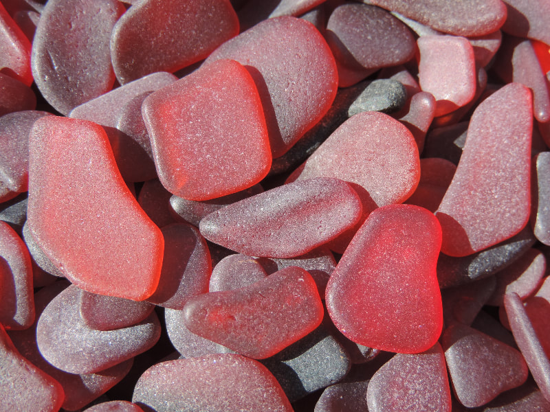 red sea glass where does it come from